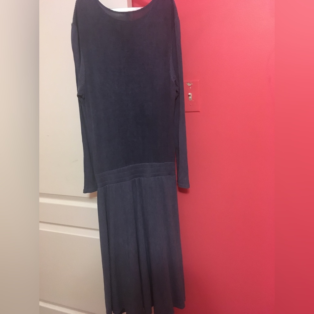 Woman’s blue ribbed dress